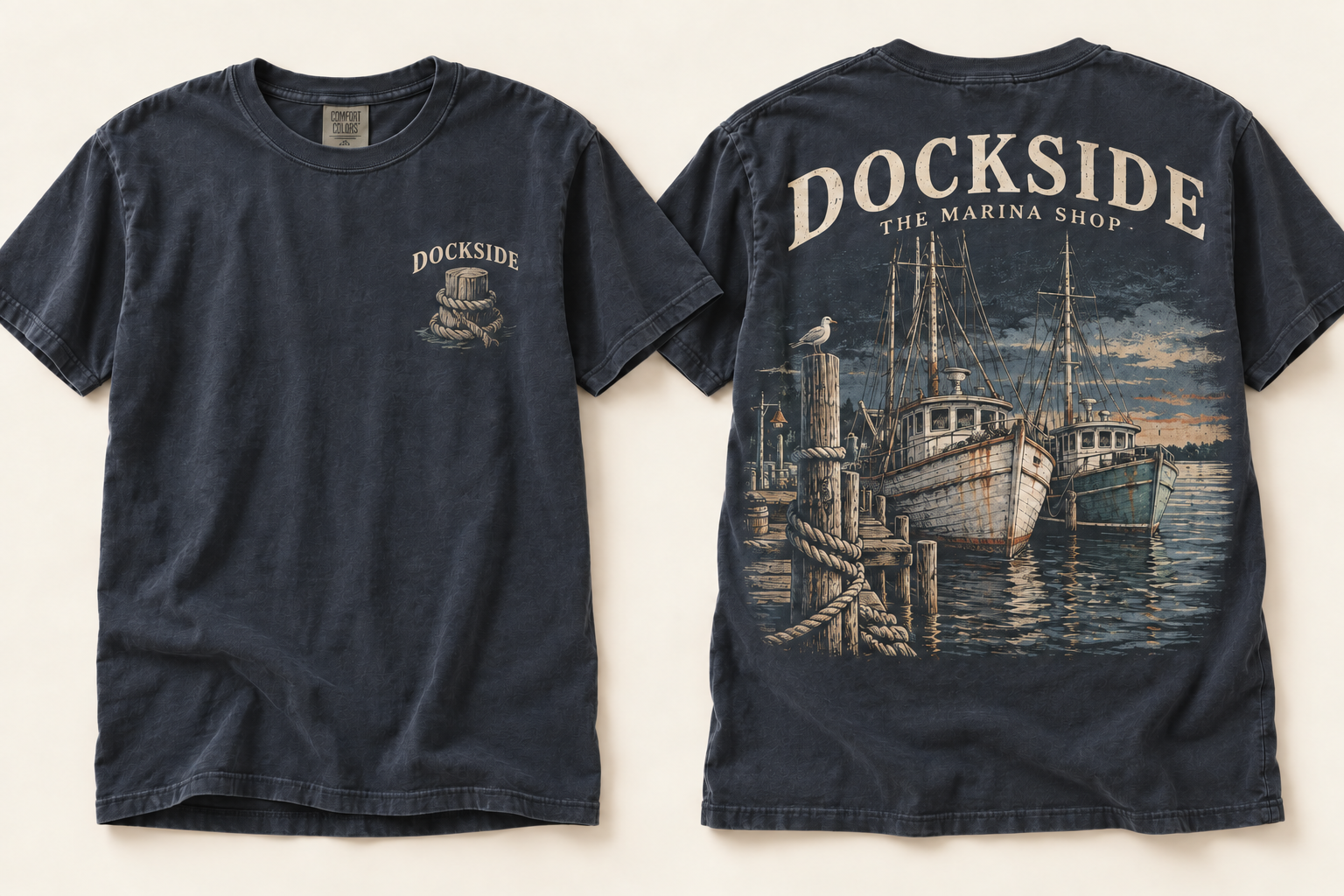 Front and back of the garment-dyed navy Dockside Old Harbor T-shirt, with trawlers tied at a marina dock